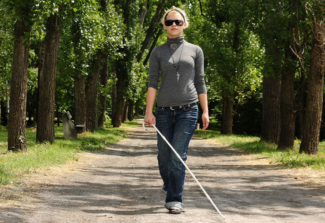 blind woman with stick