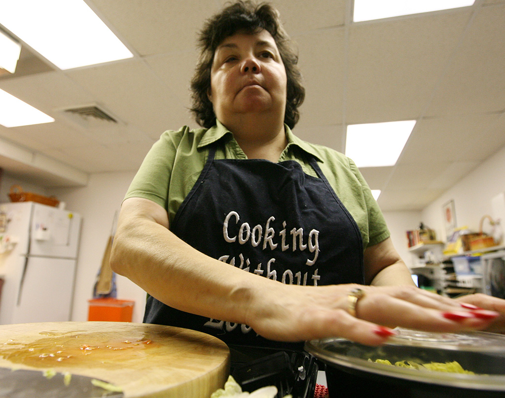 blind woman cooking